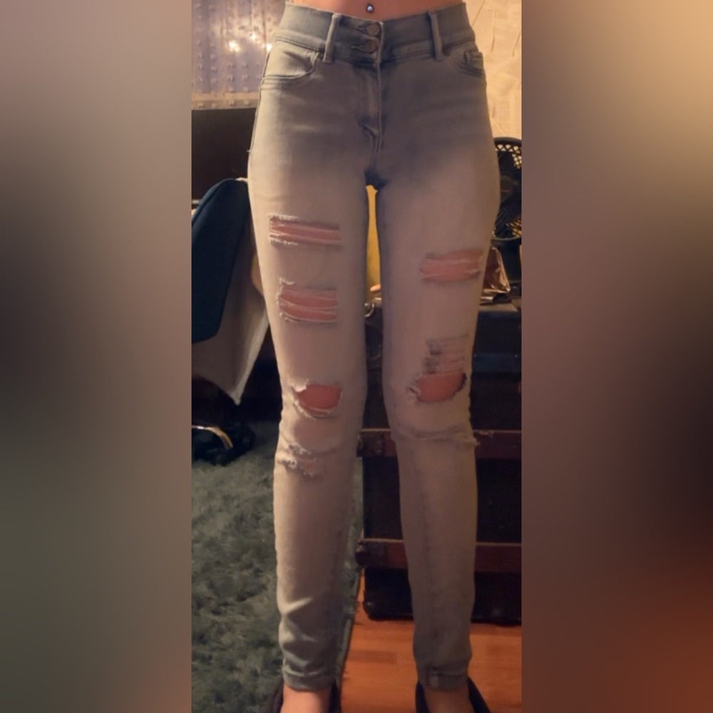 High waisted skinny jeans, light blue with rips, stretchy soft fabric